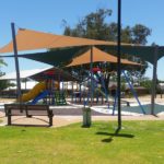 custom made shade sails covering a playground