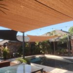 multiple custom made shade sails covering a residential pool