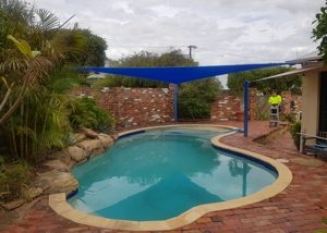 Swimming pool custom made shade sail